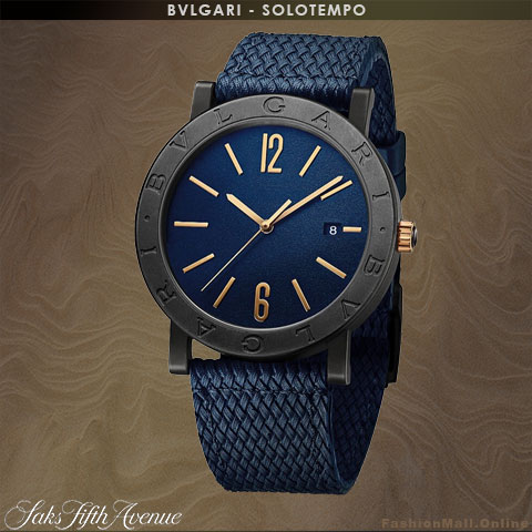 Men's BVLGARI Solotempo watch in black case with blue dial, bulgari engraved bezel with rose gold hour markers and hands and a blue rubber strap.